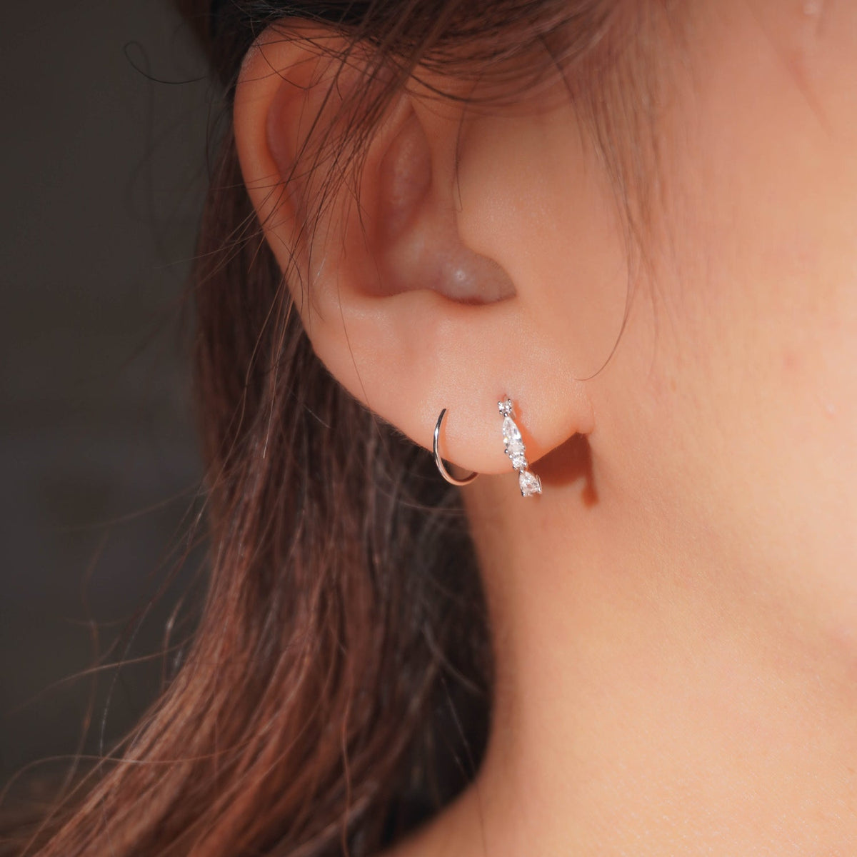Sleek Arc Spiral Hoop Twist Earrings