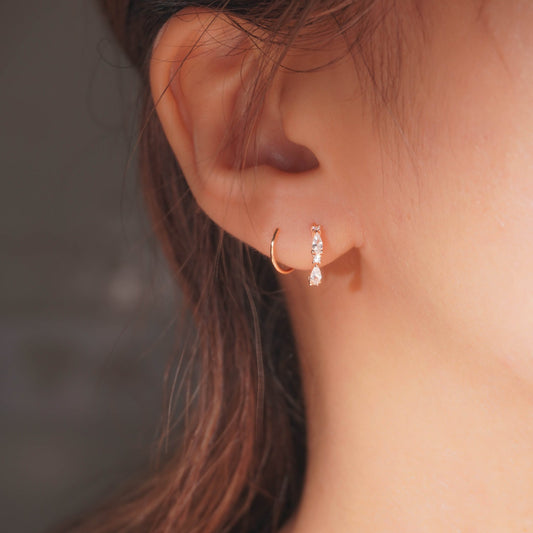Sleek Arc Spiral Hoop Twist Earrings
